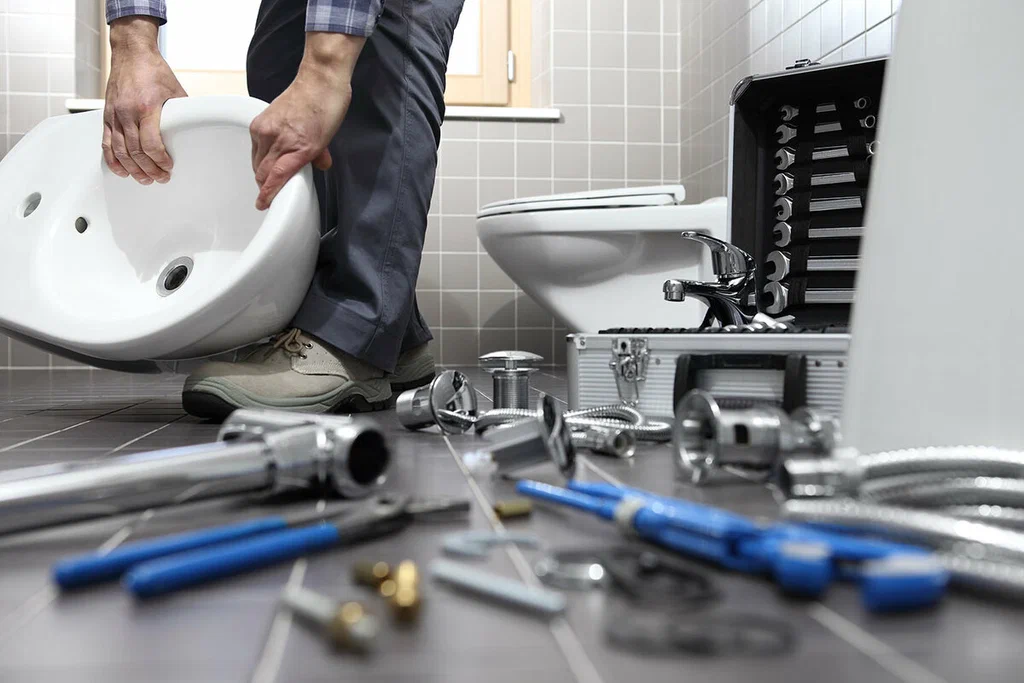 Plumbing tools prepared for a bathroom repair in Roswell